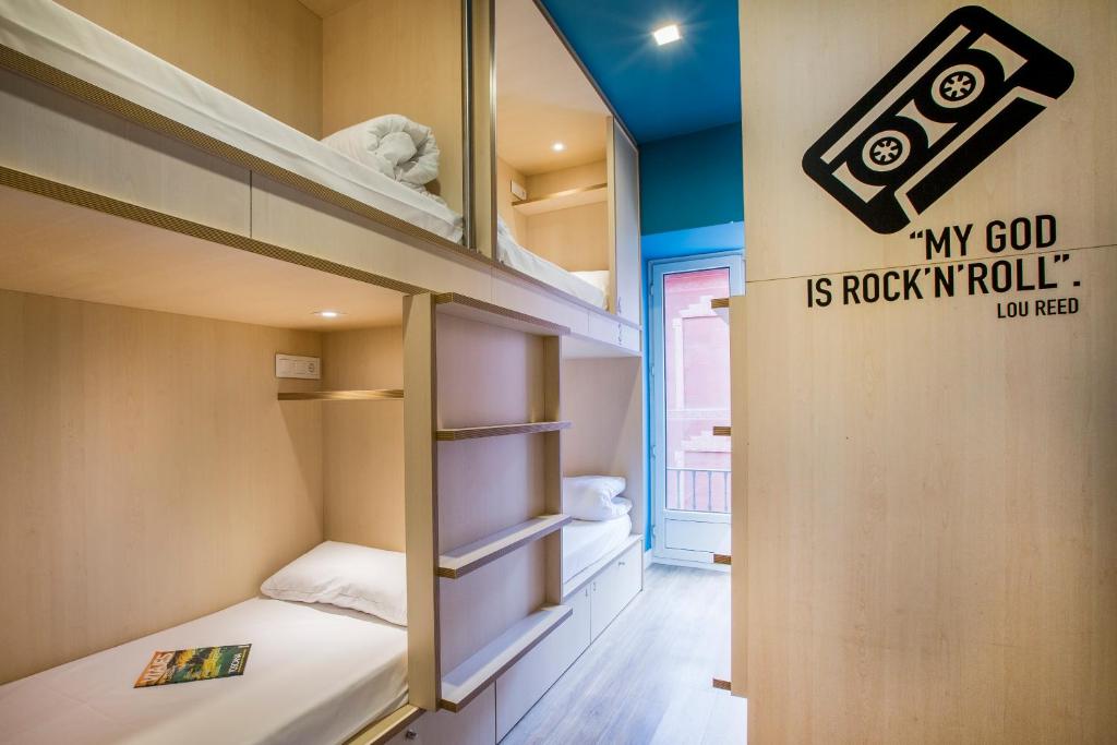 Cama o camas de una habitación en Mola Hostel