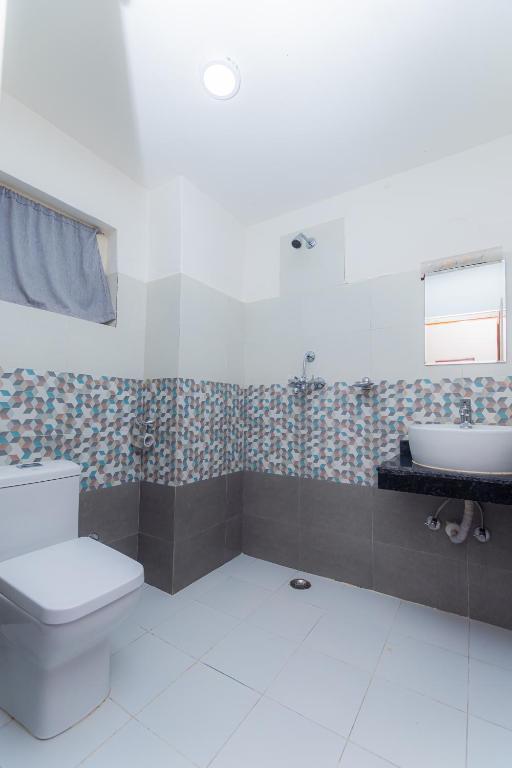 Koupelna v ubytování Amber Royel Hotel