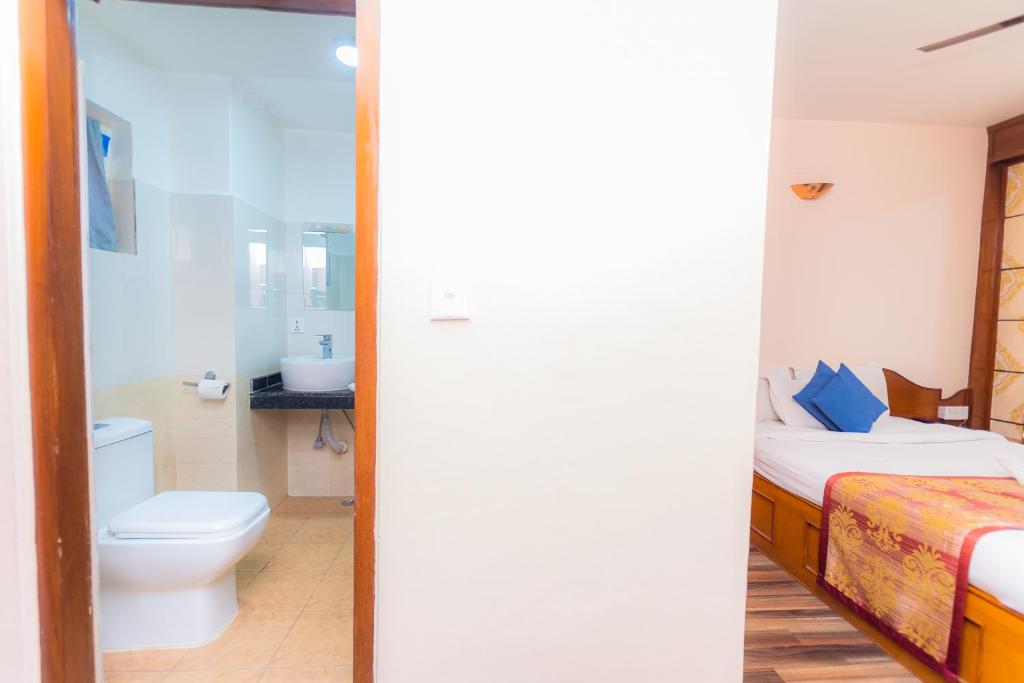 Koupelna v ubytování Amber Royel Hotel