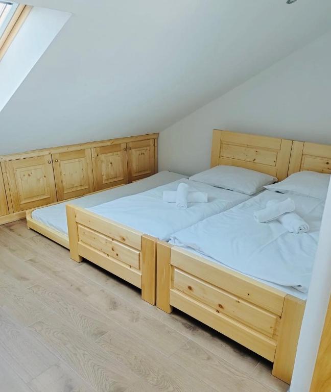 Postel nebo postele na pokoji v ubytování Hotel & wellness Hejtmanka