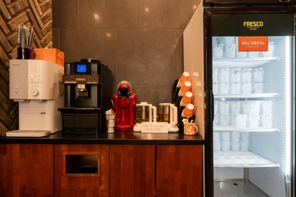 Kuchyň nebo kuchyňský kout v ubytování JB Design Hotel