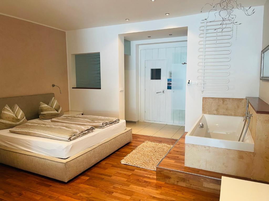 Postel nebo postele na pokoji v ubytování Premium Apartments Faselehof