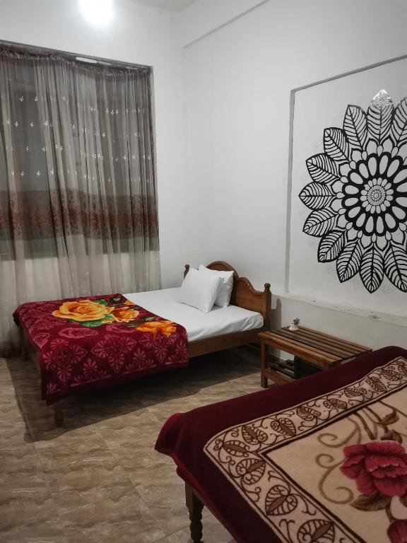 Postel nebo postele na pokoji v ubytování Rv Budget Hostel