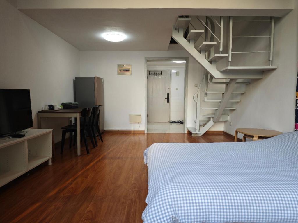 TV a/nebo společenská místnost v ubytování iNestin Shanghai Apt Xinjinqiao Road