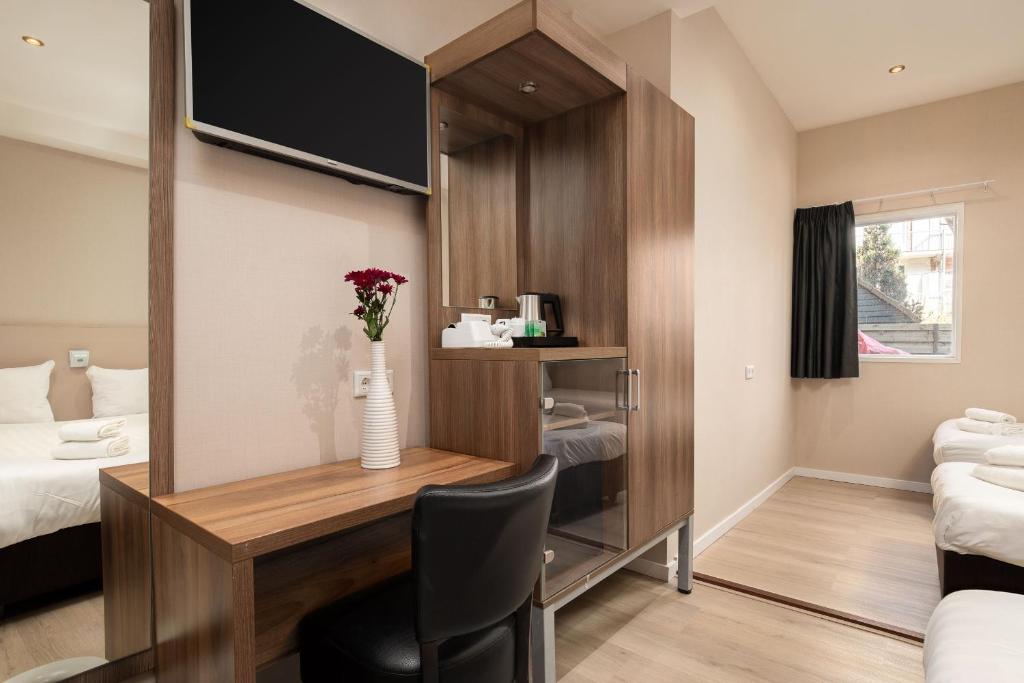 Postel nebo postele na pokoji v ubytování Hotel Victorie