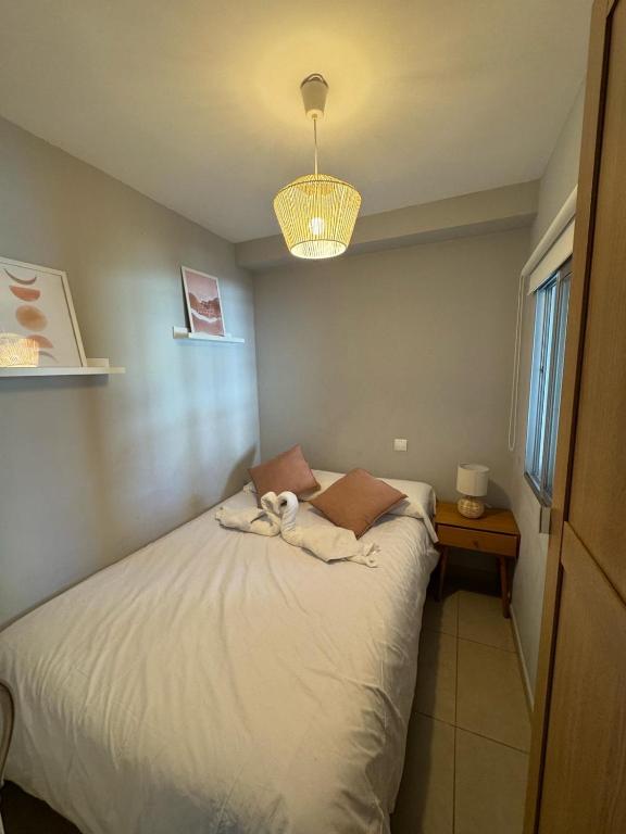 Postel nebo postele na pokoji v ubytování Apartamento Almar PLAYA DE LEVANTE