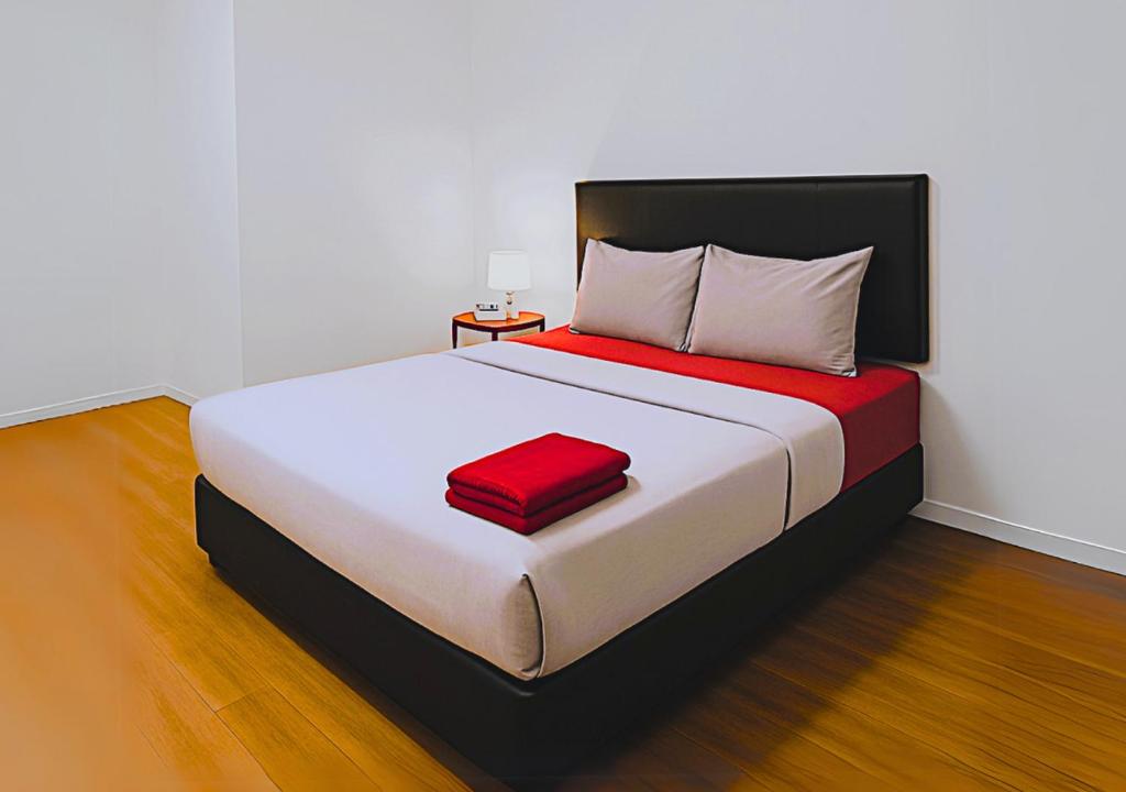 Ένα ή περισσότερα κρεβάτια σε δωμάτιο στο Intime Stay by Intime Hotel