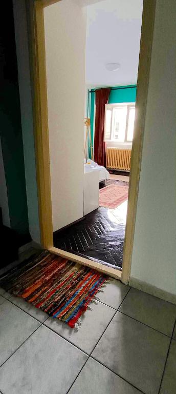 Postel nebo postele na pokoji v ubytování Chez Marcel la Briza Dunării