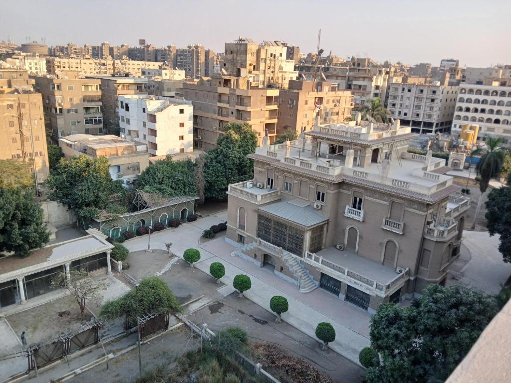 an aerial view of a city with buildings at 378 Pyramids St -Two bedrooms Hotel Apartment in Cairo