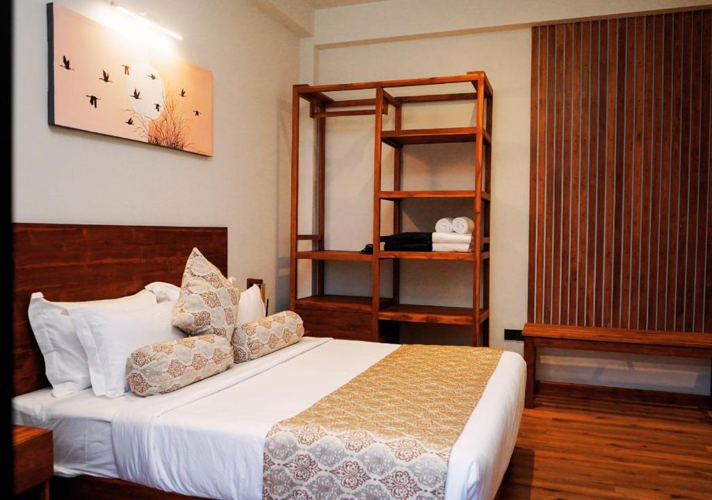 Postel nebo postele na pokoji v ubytování Diyakawa Boutique Hotel