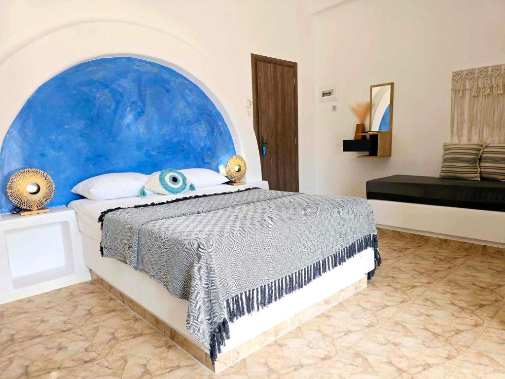 Postel nebo postele na pokoji v ubytování Papafotis Apartments & Suites
