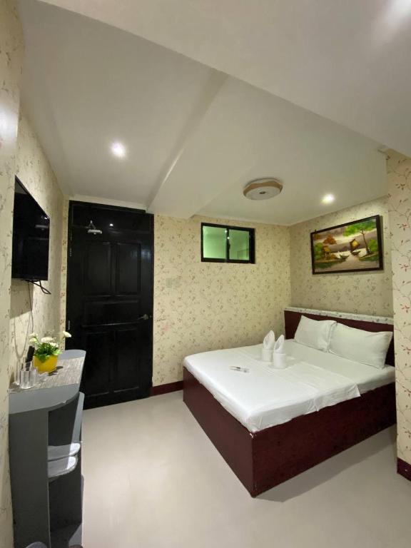 Postel nebo postele na pokoji v ubytování Elena's Suite El Nido
