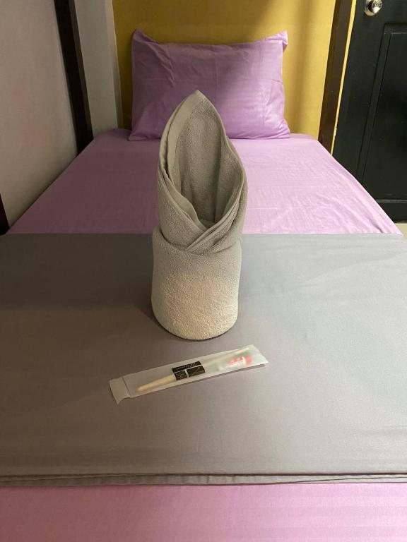 Postel nebo postele na pokoji v ubytování Elena's Suite El Nido