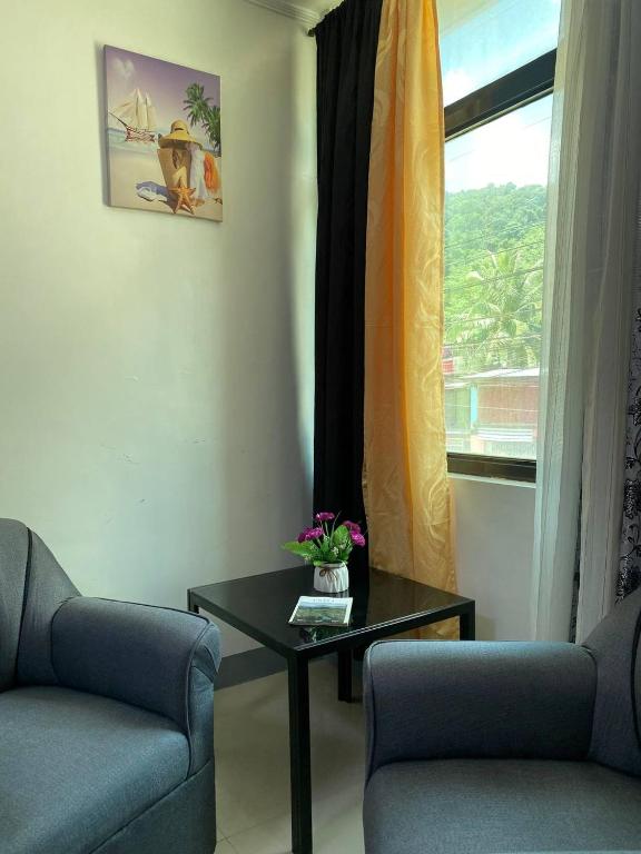 Posezení v ubytování Elena's Suite El Nido