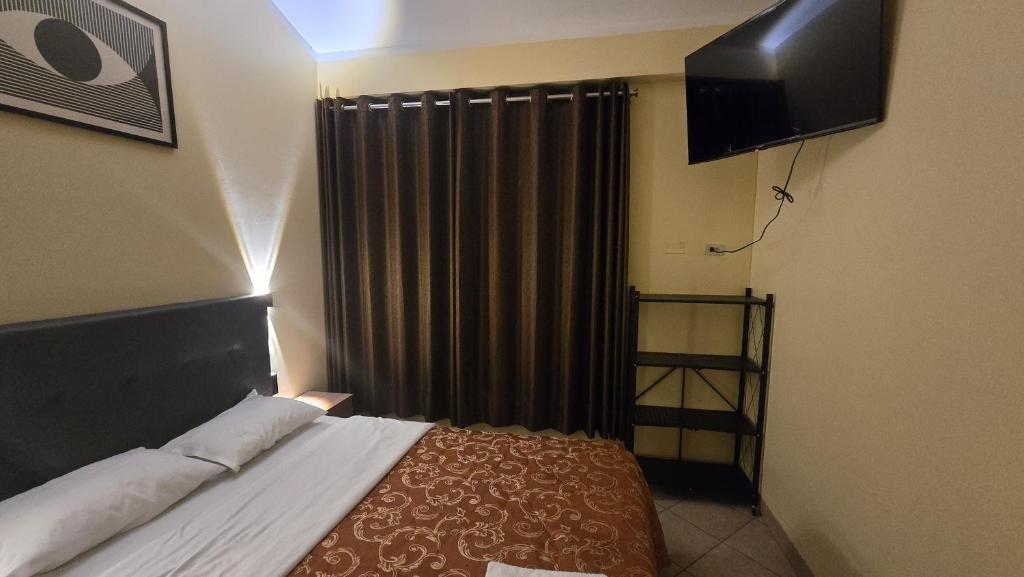 Postel nebo postele na pokoji v ubytování HOSPEDAJE DONA Ayacucho