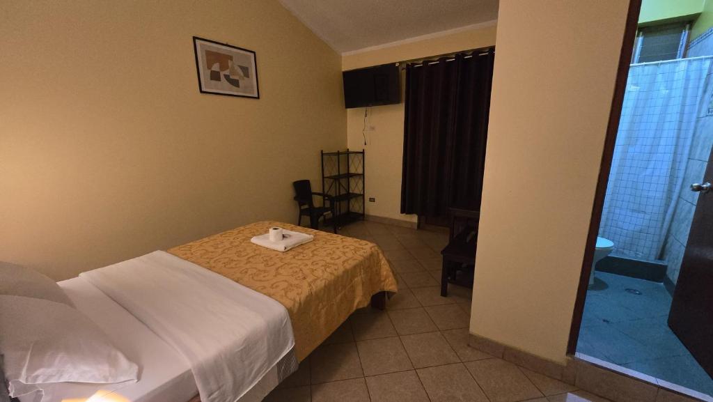Postel nebo postele na pokoji v ubytování HOSPEDAJE DONA Ayacucho