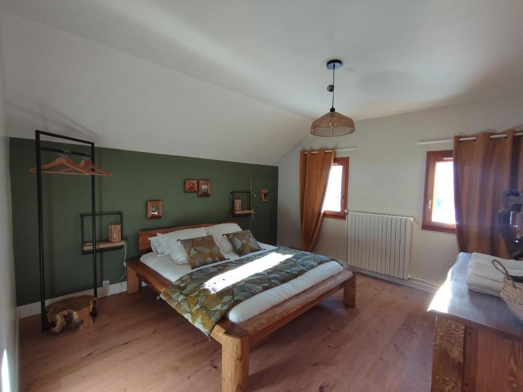 Postel nebo postele na pokoji v ubytování La Terrasse des Ecrins