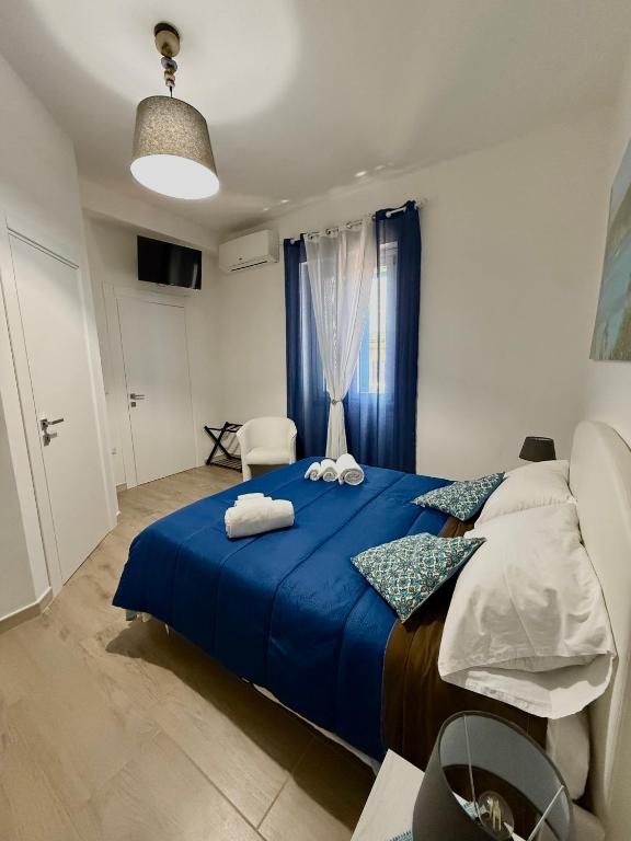 Postel nebo postele na pokoji v ubytování B&B Nonna Olga