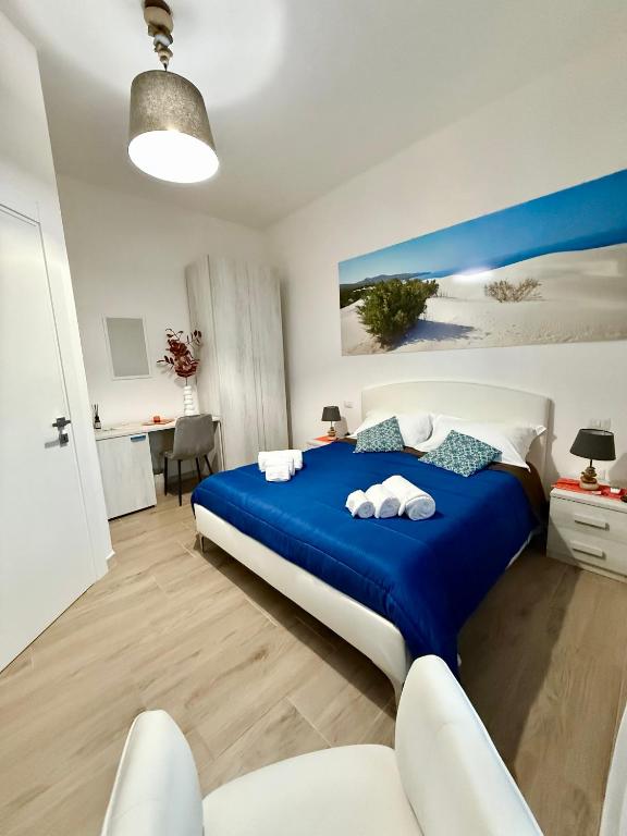 Postel nebo postele na pokoji v ubytování B&B Nonna Olga