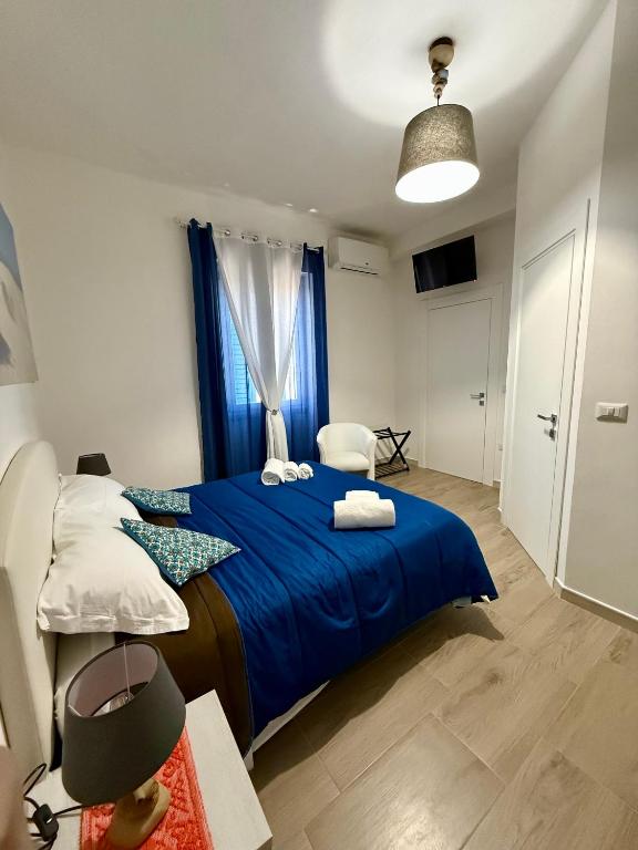 Postel nebo postele na pokoji v ubytování B&B Nonna Olga