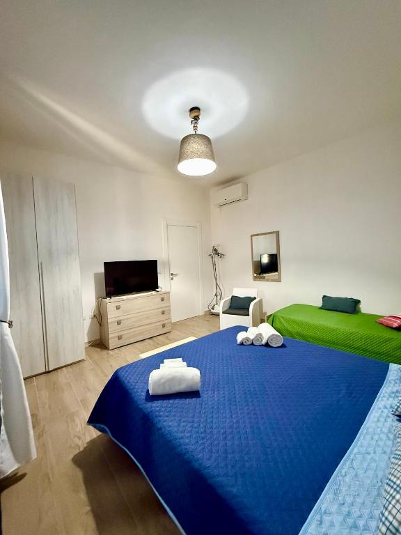 Postel nebo postele na pokoji v ubytování B&B Nonna Olga