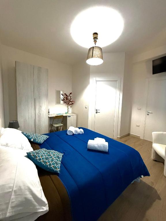 Postel nebo postele na pokoji v ubytování B&B Nonna Olga