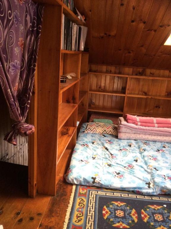 Postel nebo postele na pokoji v ubytování Sagun's Place