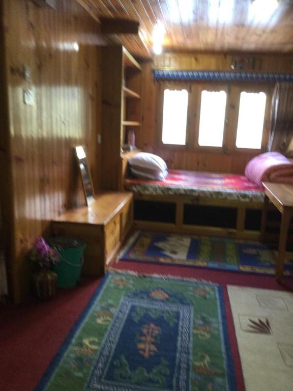 Postel nebo postele na pokoji v ubytování Sagun's Place