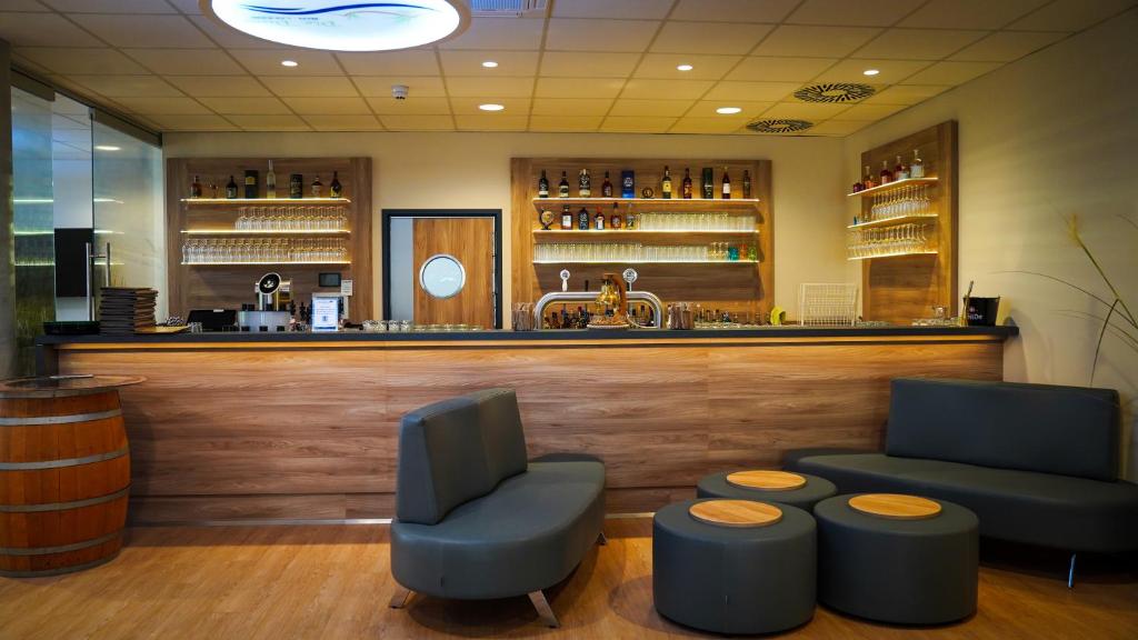 Lounge nebo bar v ubytování DLRG Tagungszentrum Hotel Delphin