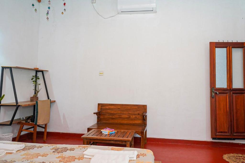 Postel nebo postele na pokoji v ubytování 4ty two Homestay Galle