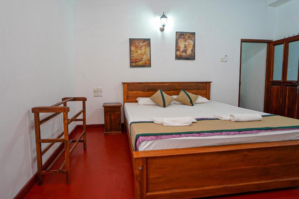 Postel nebo postele na pokoji v ubytování 4ty two Homestay Galle