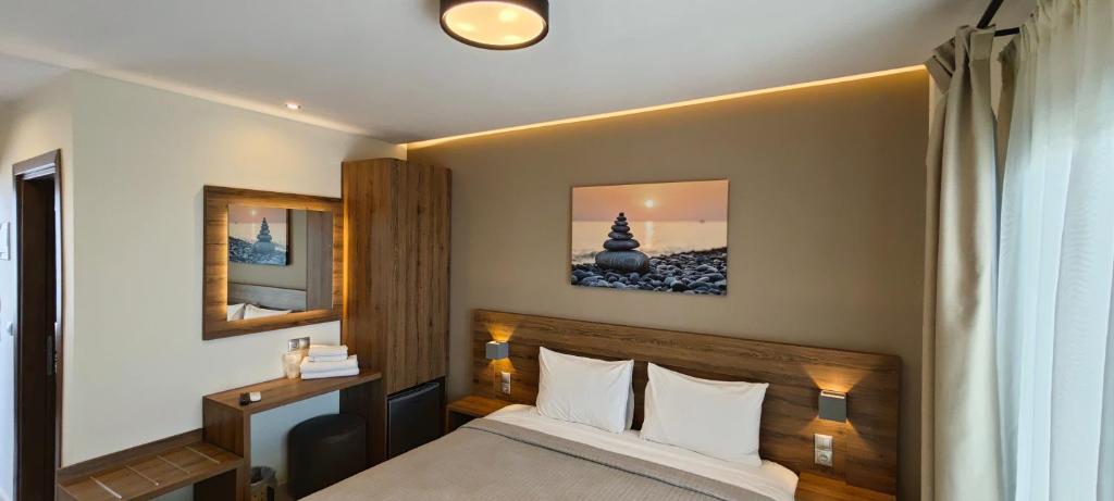 Postel nebo postele na pokoji v ubytování Sunset Hotel