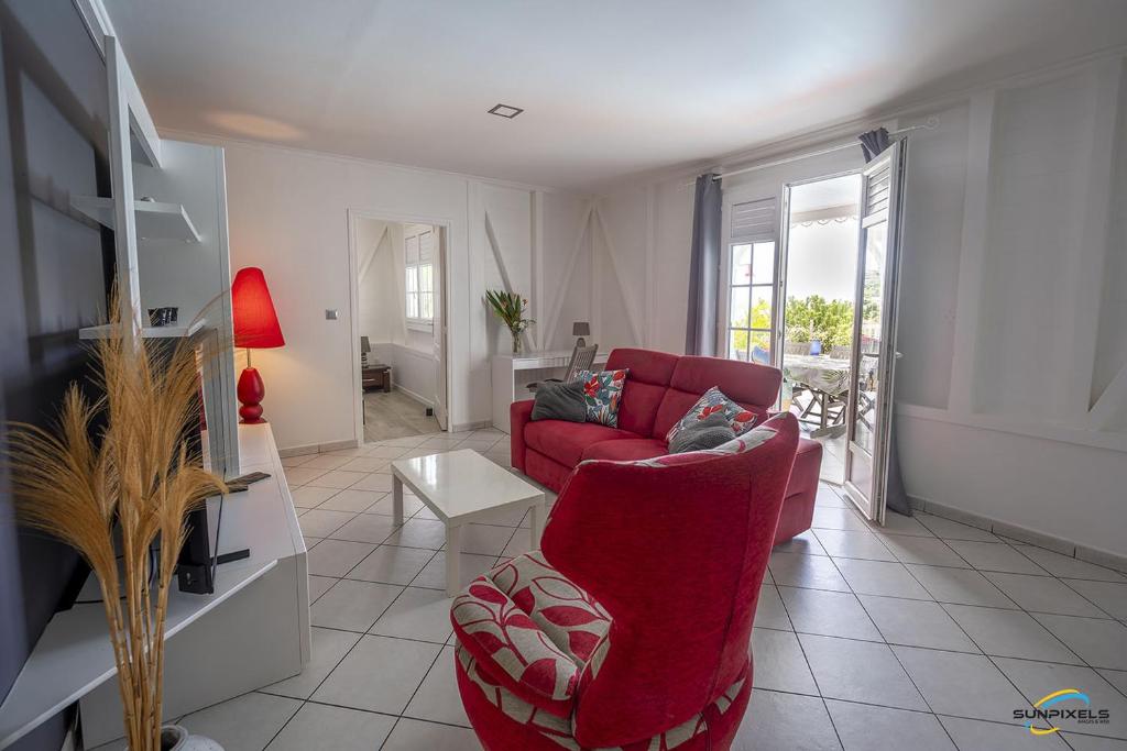 Posezení v ubytování Villa An ti kwen paradi 3 chambres avec piscine et vue mer