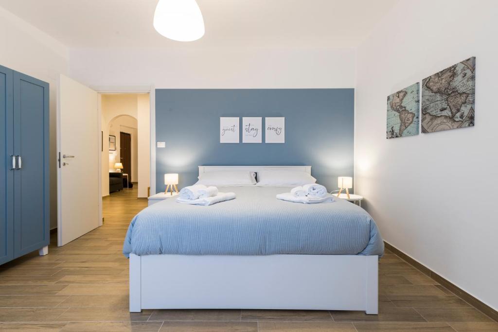 Postel nebo postele na pokoji v ubytování Kalos apartments