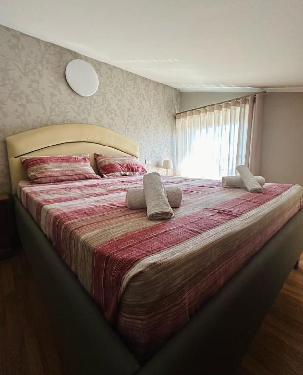Postel nebo postele na pokoji v ubytování Casa Olivastri