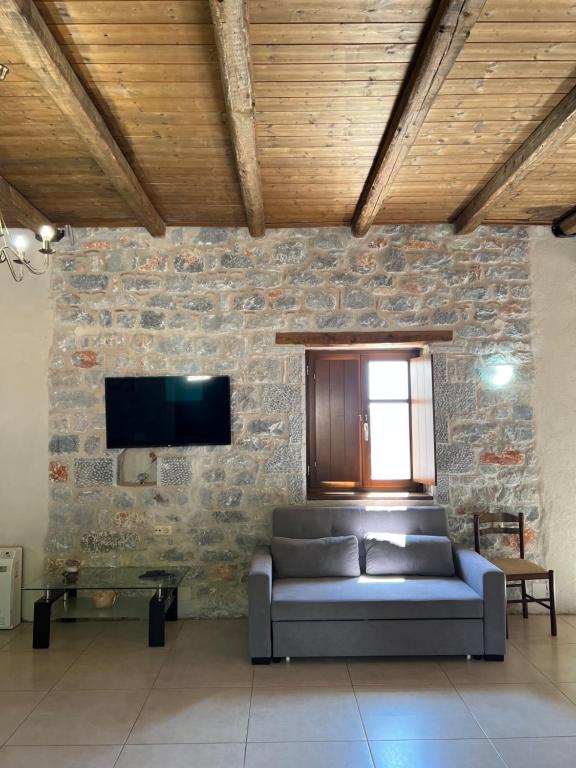 TV a/nebo společenská místnost v ubytování Koukouri Village