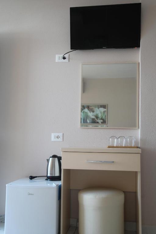 Příslušenství pro přípravu čaje a kávy v ubytování LakeFront House