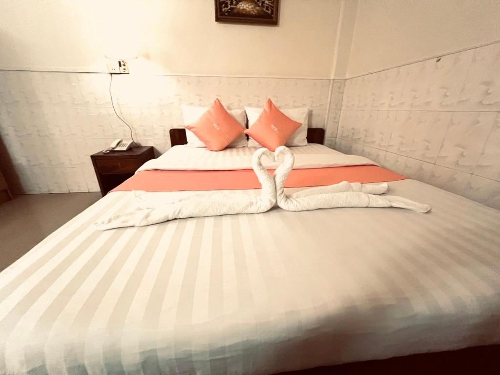 Postel nebo postele na pokoji v ubytování Nice Guesthouse