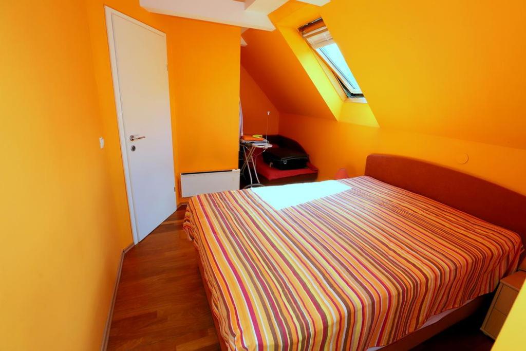 Postel nebo postele na pokoji v ubytování BledRoom