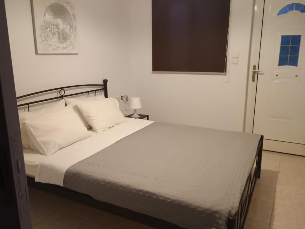Katil atau katil-katil dalam bilik di Nikitas apartment 2