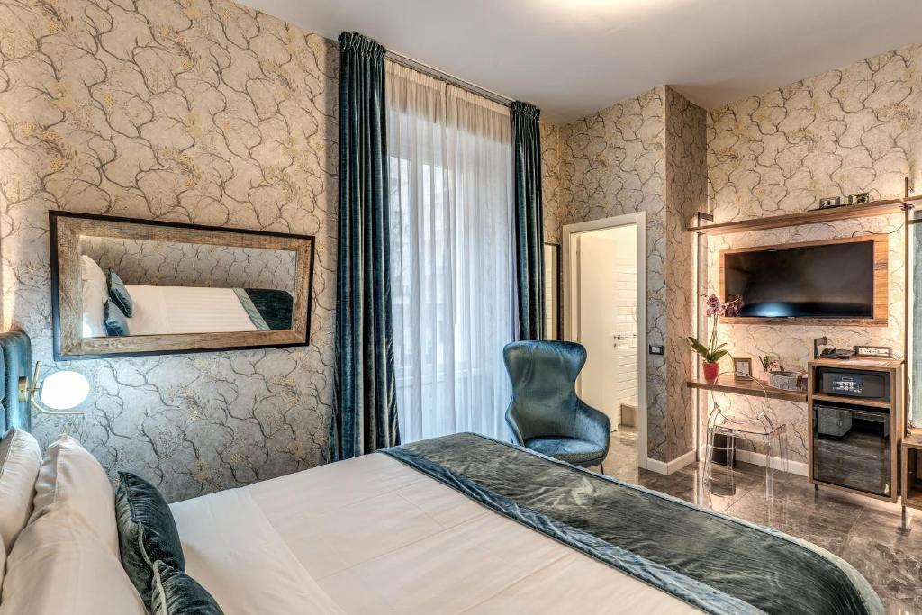Postel nebo postele na pokoji v ubytování Apollo Boutique Hotel