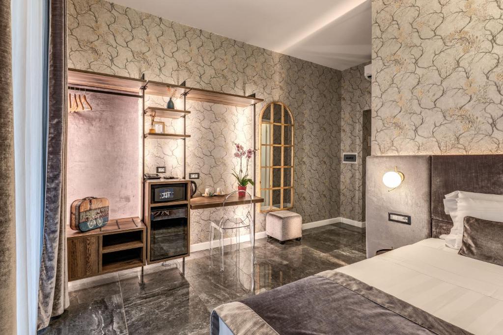 Postel nebo postele na pokoji v ubytování Apollo Boutique Hotel