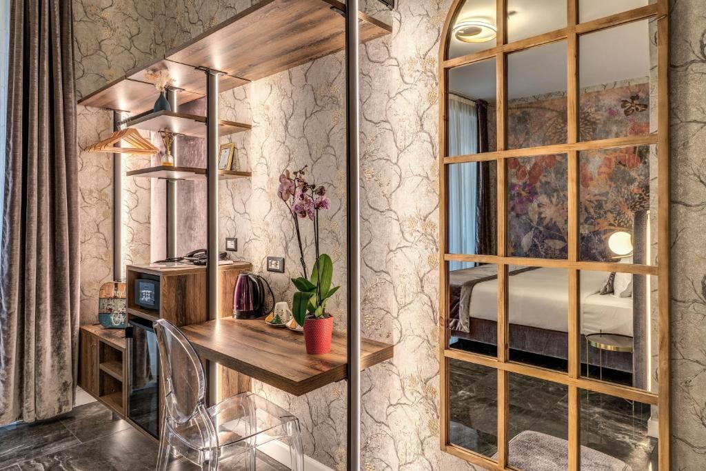Postel nebo postele na pokoji v ubytování Apollo Boutique Hotel