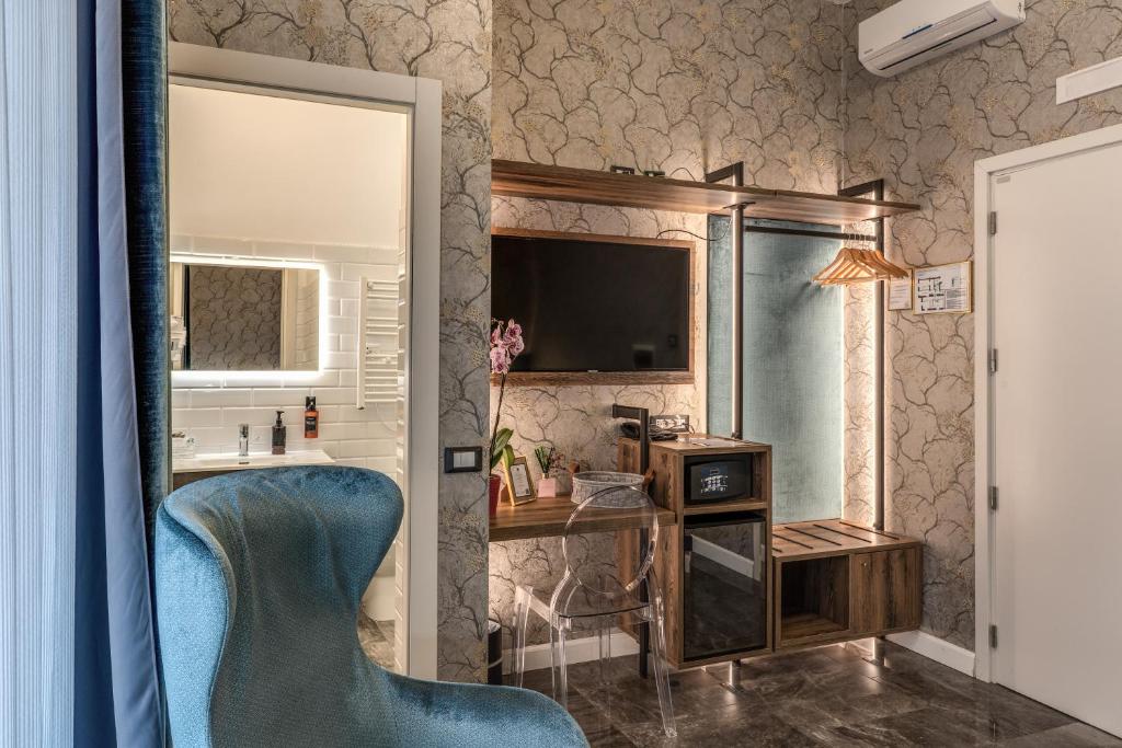 Kuchyň nebo kuchyňský kout v ubytování Apollo Boutique Hotel