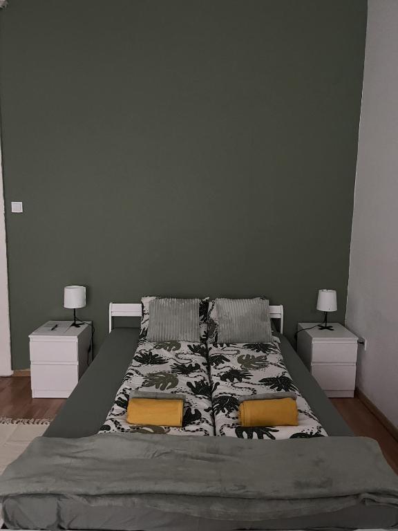 A bed or beds in a room at Palace district rooms
