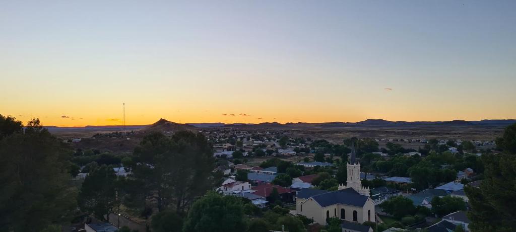an aerial view of a small town at sunset at Rusgenot - Richmond, Karoo in Richmond