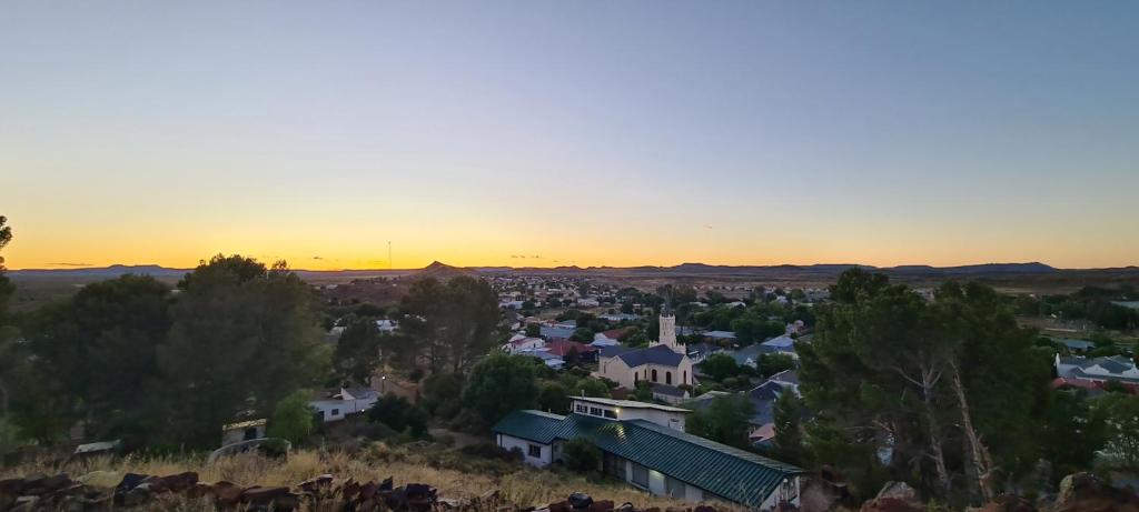 an aerial view of a small town at sunset at Rusgenot - Richmond, Karoo in Richmond