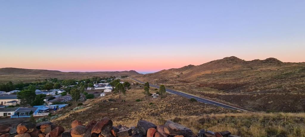 an aerial view of a small town on a hill at Rusgenot - Richmond, Karoo in Richmond