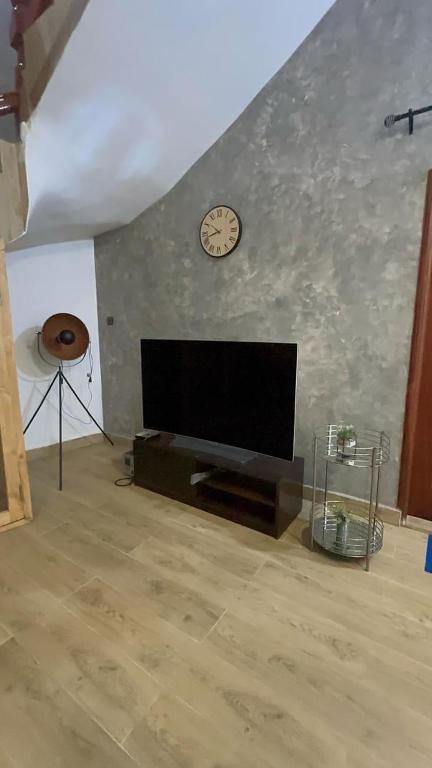 TV a/nebo společenská místnost v ubytování Beautiful warm duplex