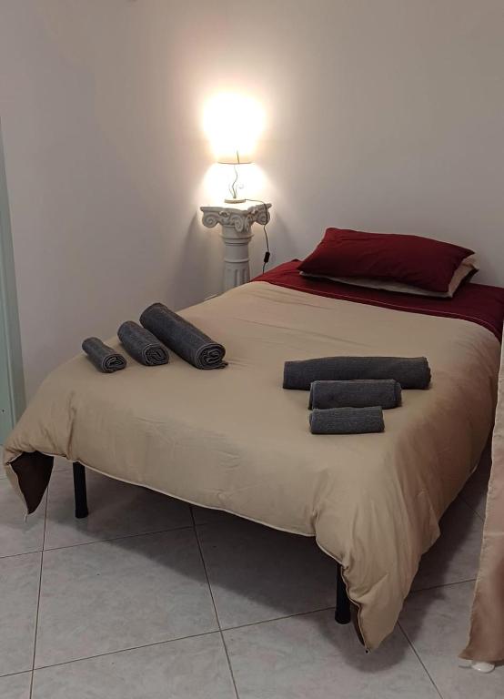 Postel nebo postele na pokoji v ubytování Casa Vacanze AML